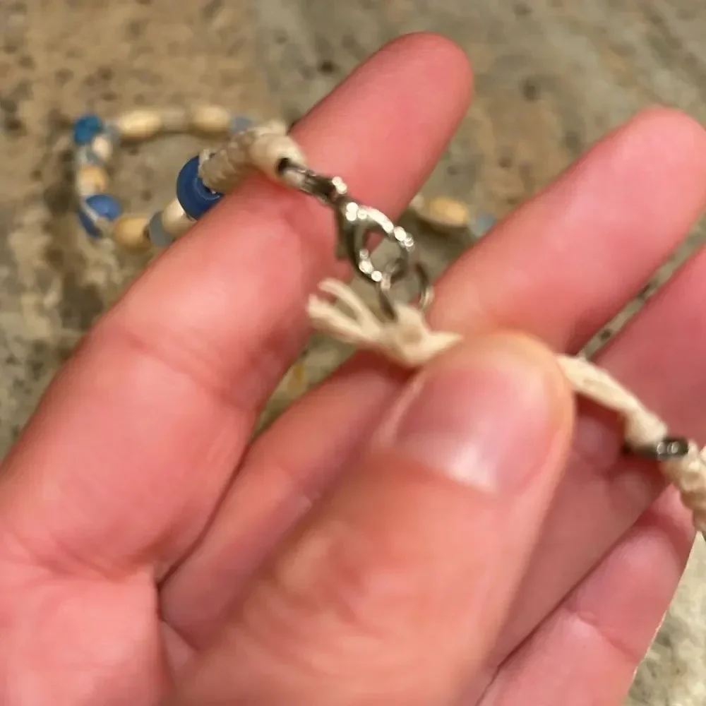 Kids beaded necklace with a silver turtle at the bottom of the necklace